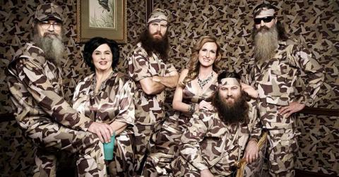 'Duck Dynasty' cast poses in camo outfits against a camo backdrop