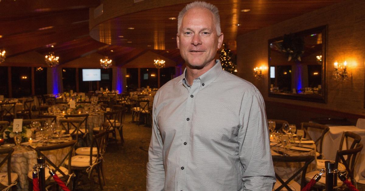 Kenny Mayne of ESPN walks off the field after he hit himself in