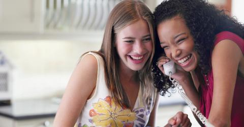 Teens Talking on Landline