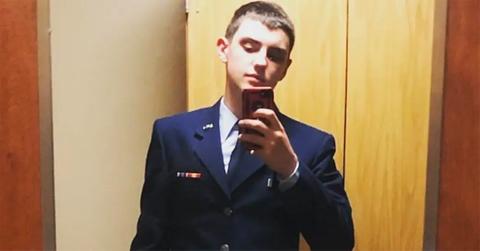 Jack Teixeira posing for a selfie in uniform in the mirror.