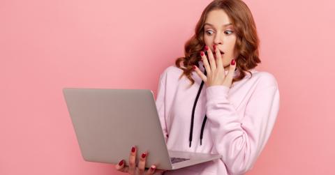Woman Shocked Looking at Computer