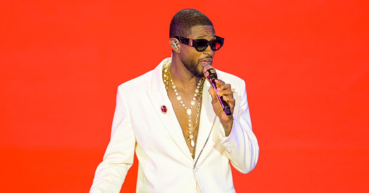 Usher performs onstage during his residency at La Seine Musicale