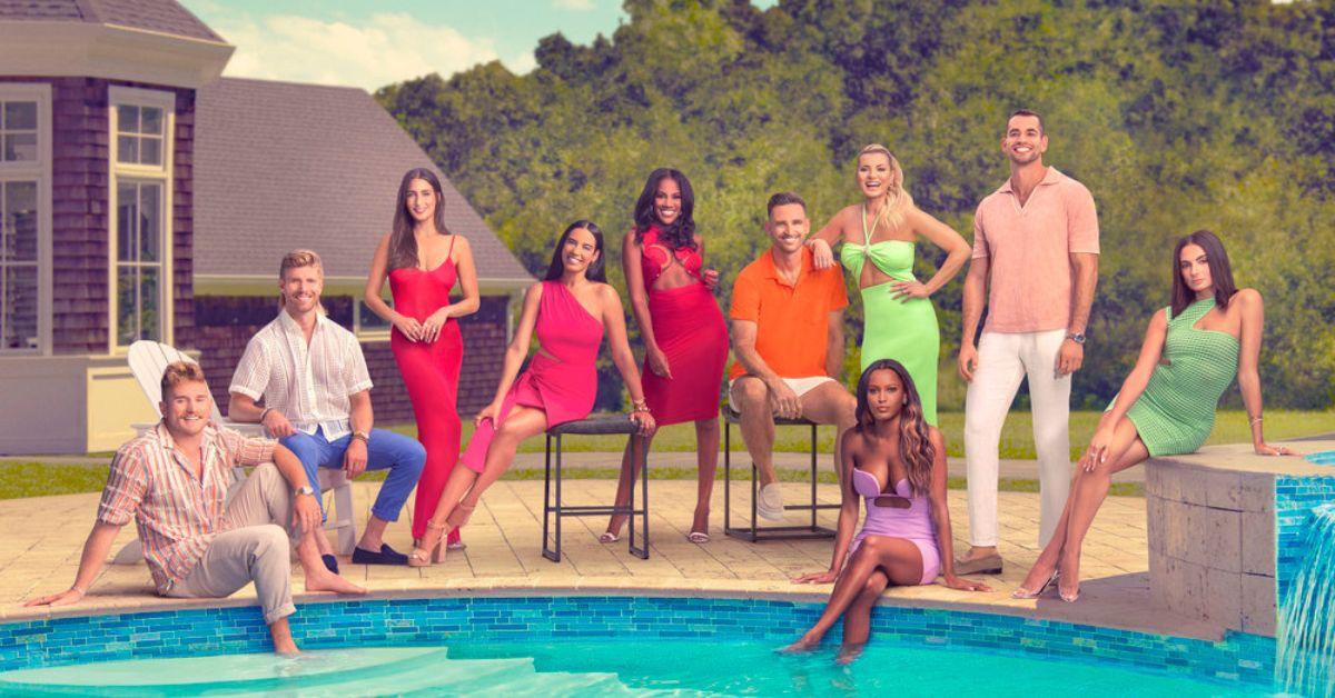The 'Summer House' Season 8 cast sitting by the swimming pool