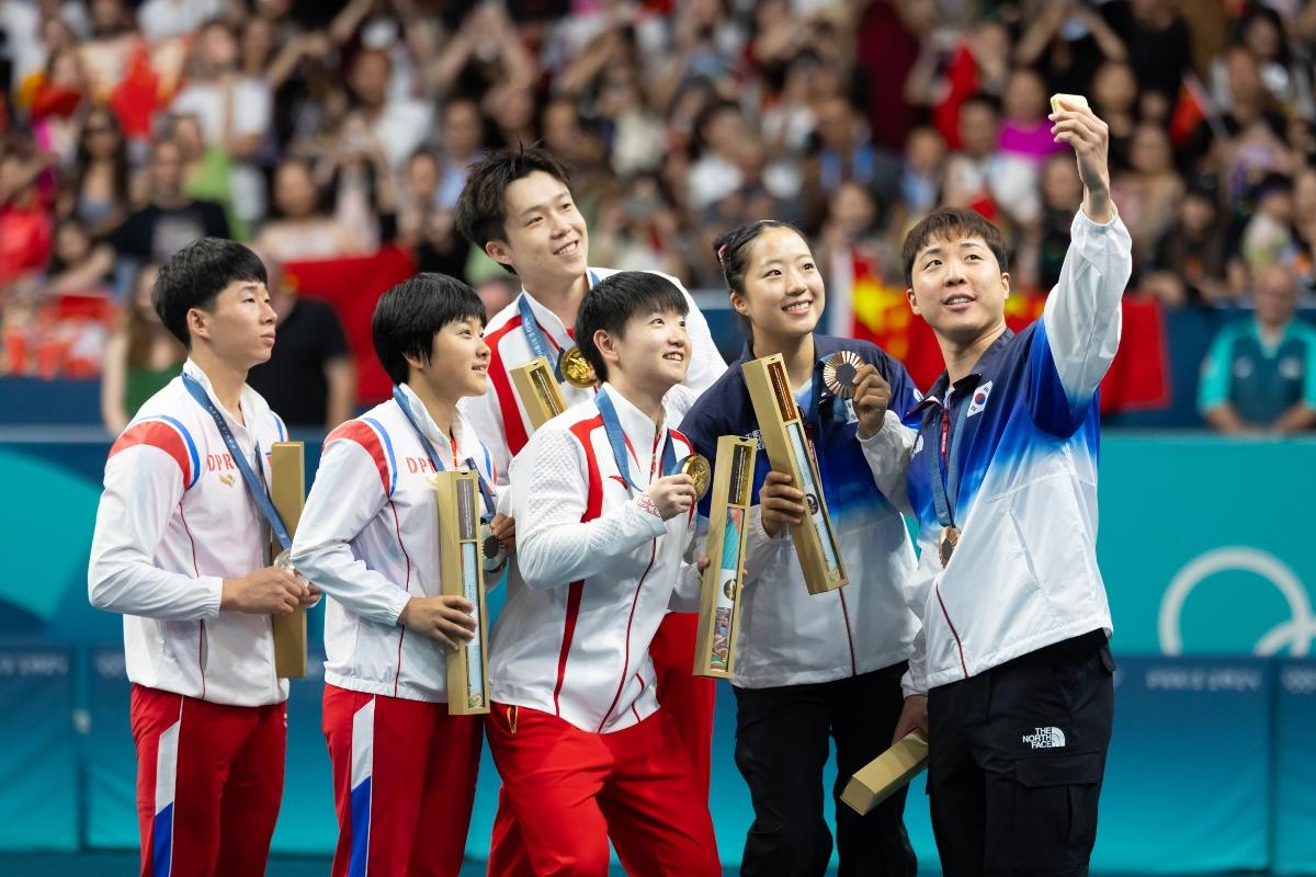 North and South Korea athletes take a selfie at the Olympics