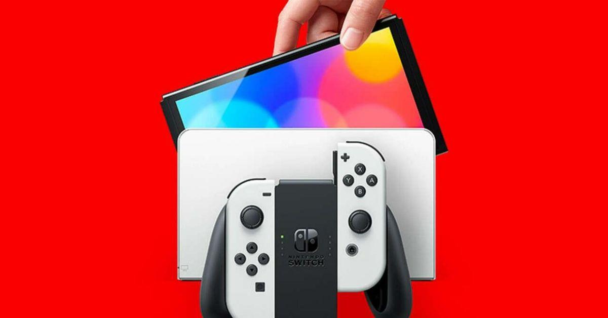 A Switch OLED Model and dock on a red background.