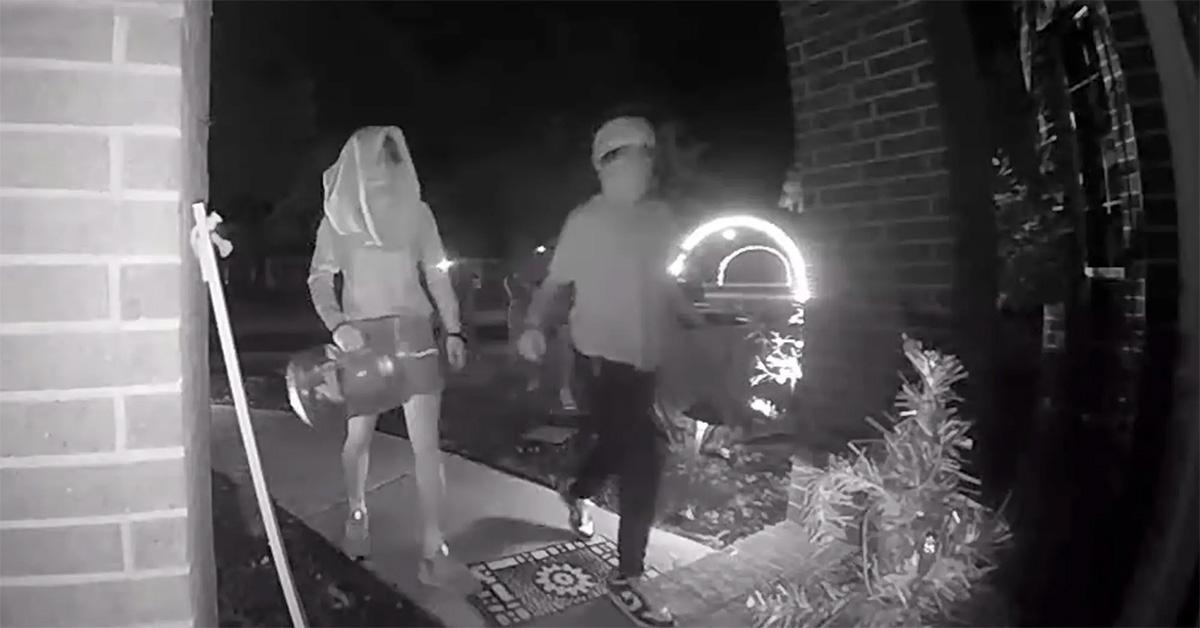 Teens walking up to a door to bang on it from doorbell footage. 