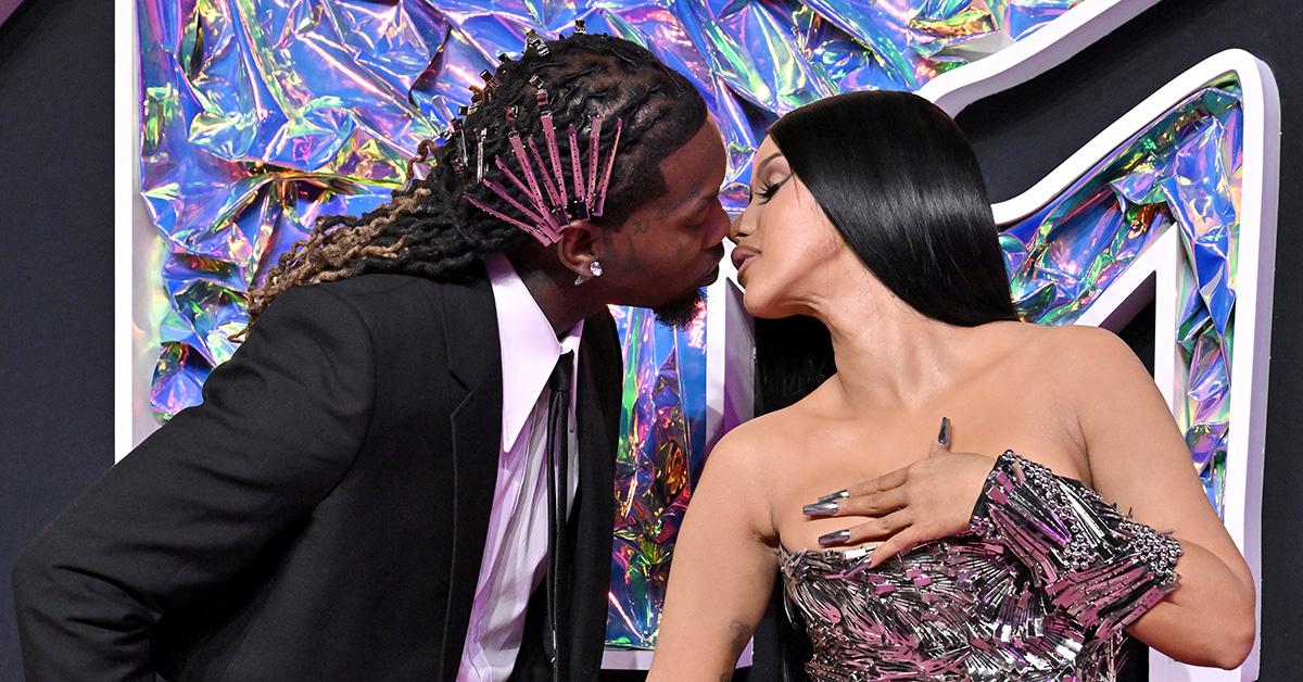 Cardi B and Offset kissing at the 2023 MTV VMAs. 