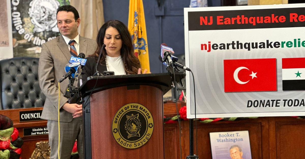 Jennifer Aydin speaking at the NJ Earthquake Relief Fund event