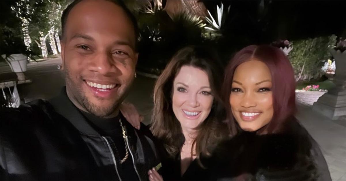 Oliver Saunders, Lisa Vanderpump, and Garcelle Beauvais take a selfie.