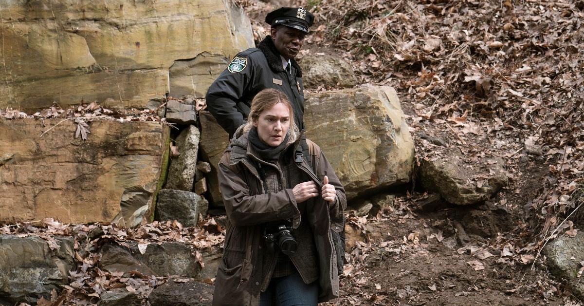 John Douglas Thompson as Police Chief Carter and Kate Winslet as Detective Mare Sheehan.