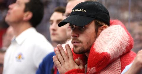 Justin Bieber looks on from the bench area of Team Matthews during their game against Team McDavid during the 2024 Honda NHL All-Star Game at Scotiabank Arena on February 03, 2024 in Toronto, Ontario, Canada. (Photo by Dave Sandford/NHLI via Getty Images)