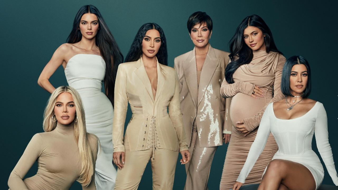 The Kardashian women in beige and cream outfits