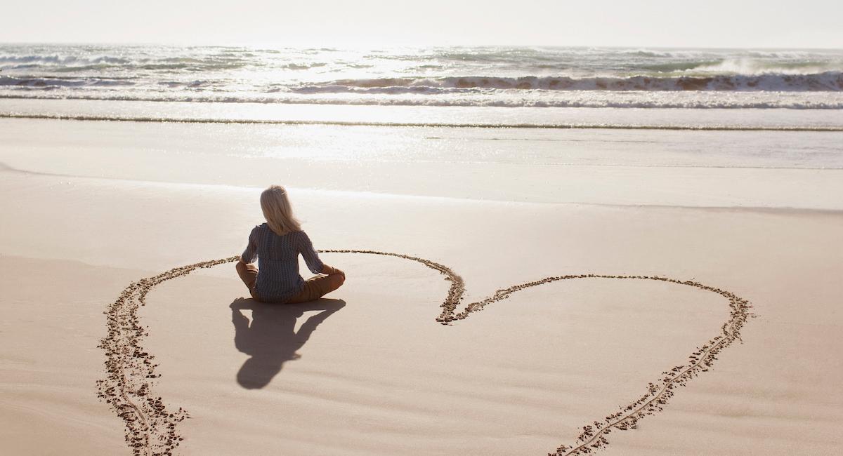 heart in sand on beach