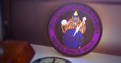 A U.S. Government logo displayed upright.