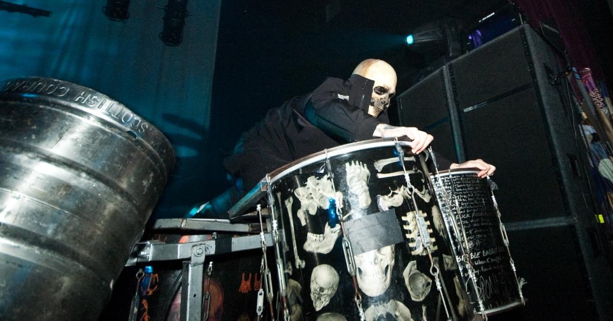 Sid Wilson wearing a skull mask while performing with Slipknot.