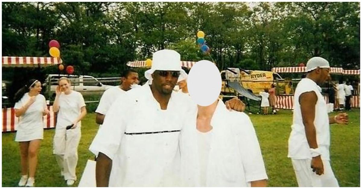 (l-r): Sean "Diddy" Combs with a guest at one of his white parties.