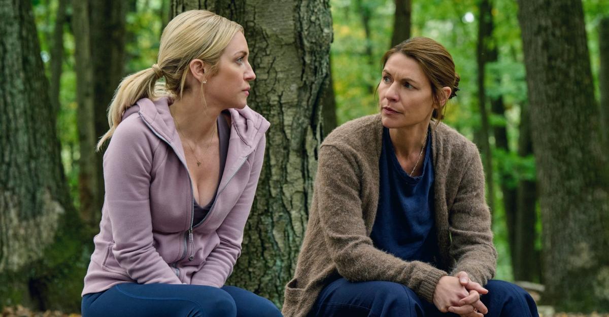 Aggie and Nina sit and talk in the woods