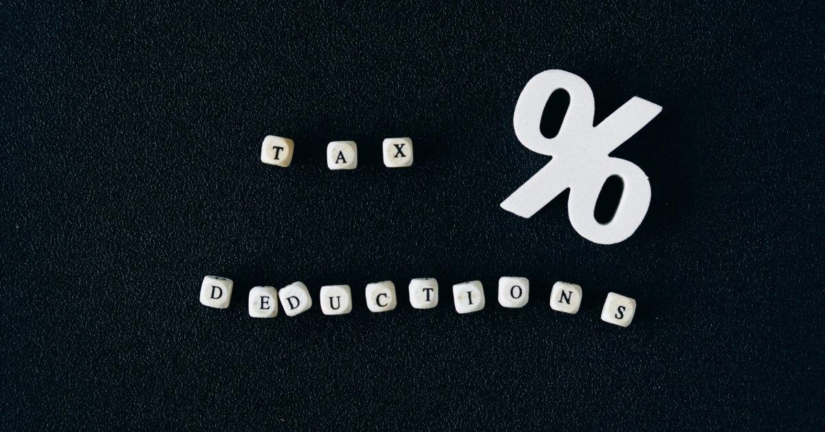 Tax deductions spelled out with mini blocks.