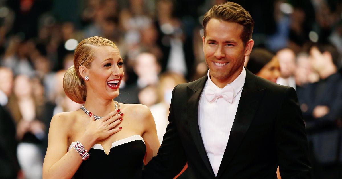 Canadian actor Ryan Reynolds and his wife US actress Blake Lively pose as they arrive for the screening of the film "Captives" at the 67th edition of the Cannes Film Festival in Cannes, southern France, on May 16, 2014. AFP PHOTO / VALERY HACHE / AFP PHOTO / VALERY HACHE (Photo credit should read VALERY HACHE/AFP via Getty Images)