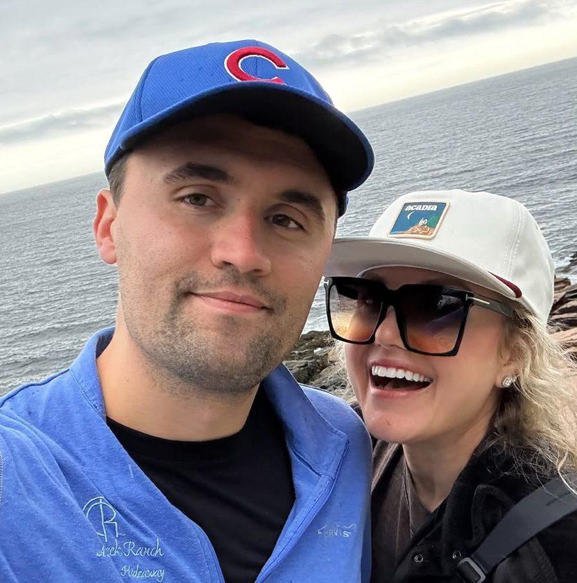 Charlie and Erika Kirk by the beach.
