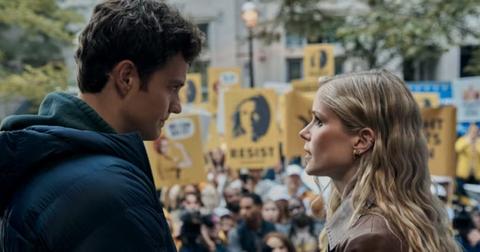 Hughie and Annie stand in front of a rally on The Boys