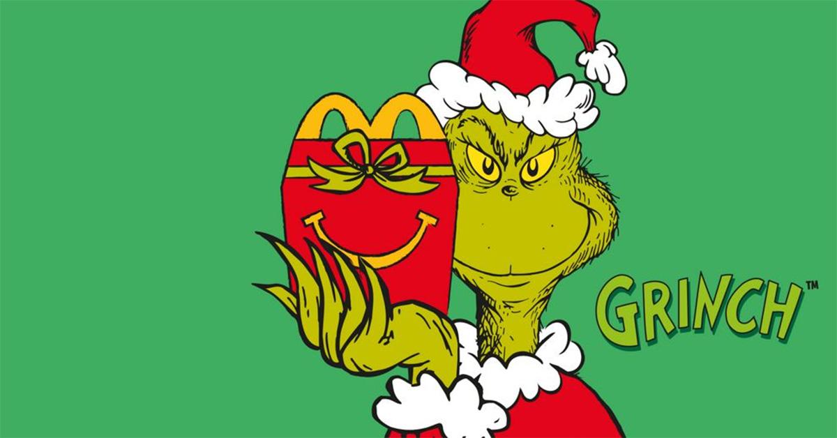 The Grinch holding a Happy Meal box. 