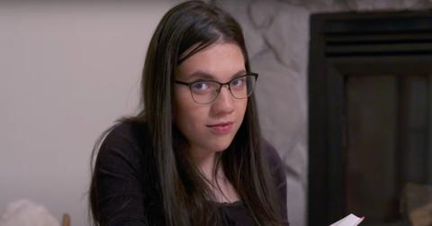 Natalia Grace reading a book