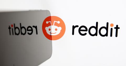 A Reddit logo on a laptop computer