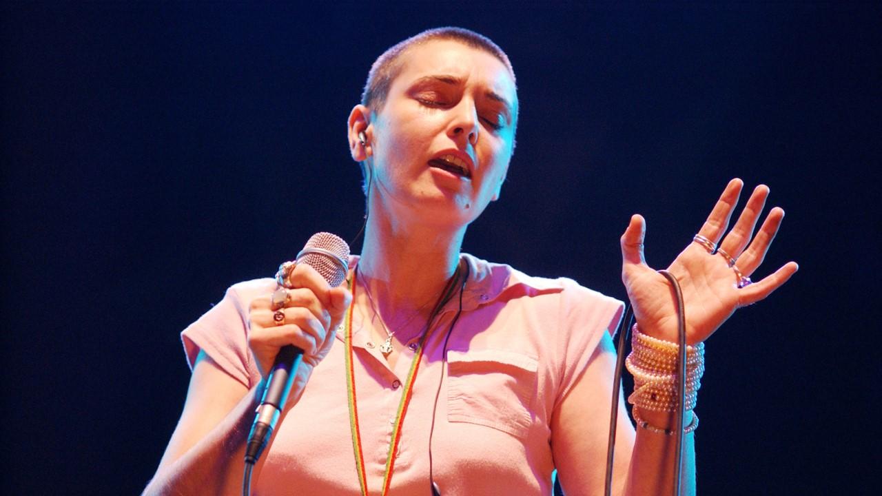 Sinéad O'Connor singing at a concert on Jan. 18, 2003, at The Point Theatre in Dublin, Ireland  