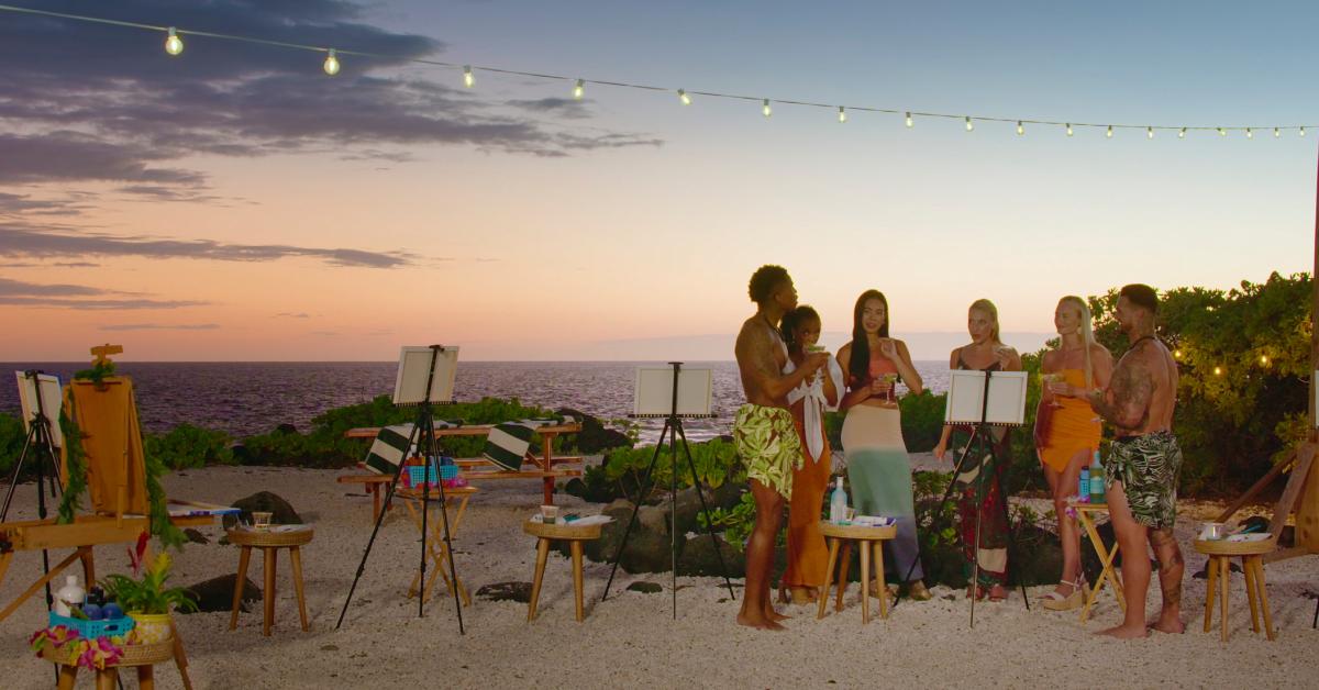 'Temptation Island' Season 9 cast during a painting date at sunset on the beach.