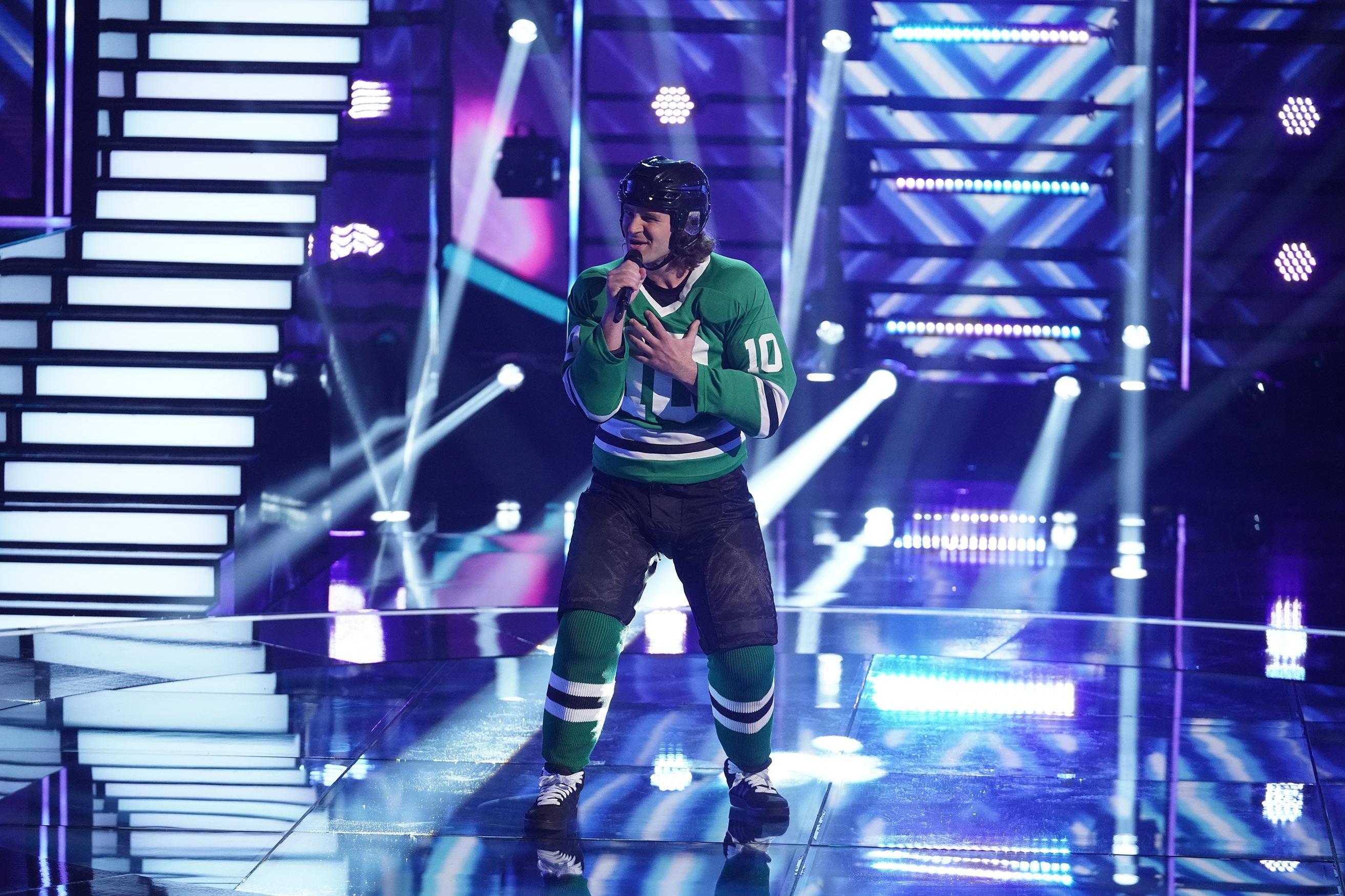 A hockey player performs as a mystery singer on 'I Can See Your Voice.'