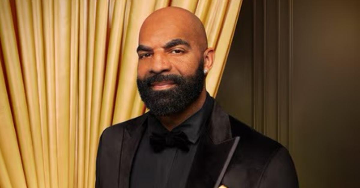 Carlos Boozer in a black suit for 'King's Court' promo.