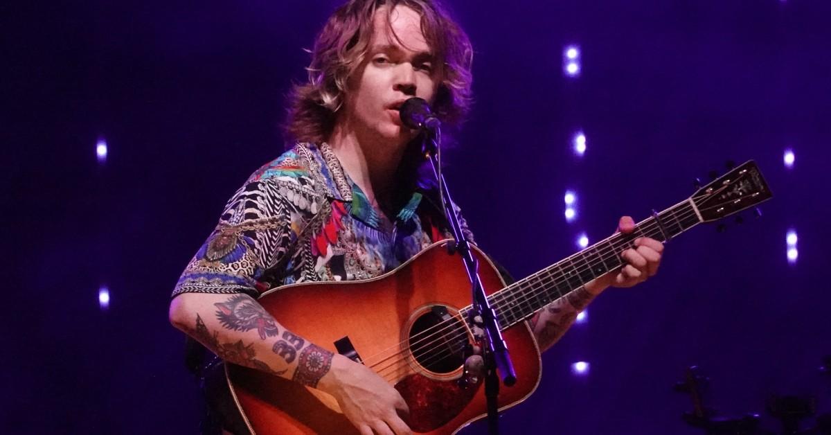 Billy Strings performing on stage