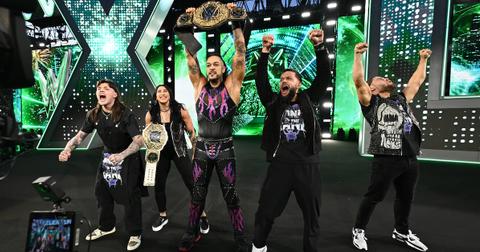 Damian Priest(M) celebrates his WWE World Championship win with Dominik Mysterio, Rhea Ripley, Finn Balor and JD McDonagh, the Judgment Day