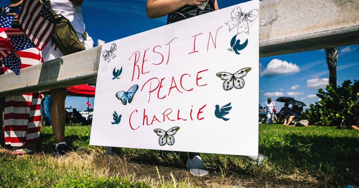 "Rest in Peace Charlie" sign hanging.