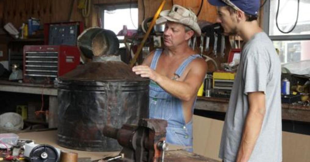 Moonshiners making bootleg alcohol