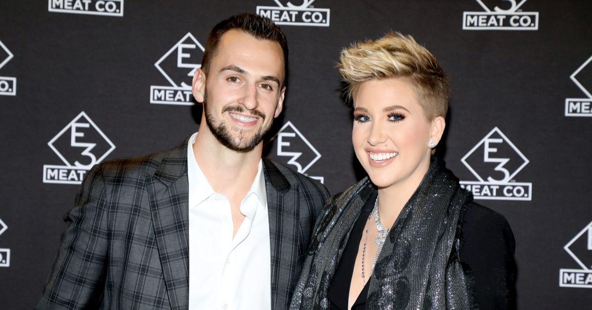 Nic Kerdiles and Savannah Chrisley attend the grand opening of E3 Chophouse Nashville on November 20, 2019