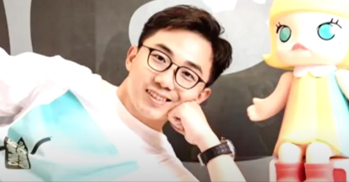 Pop Mart owner Wang Ning poses with one of his company's dolls.