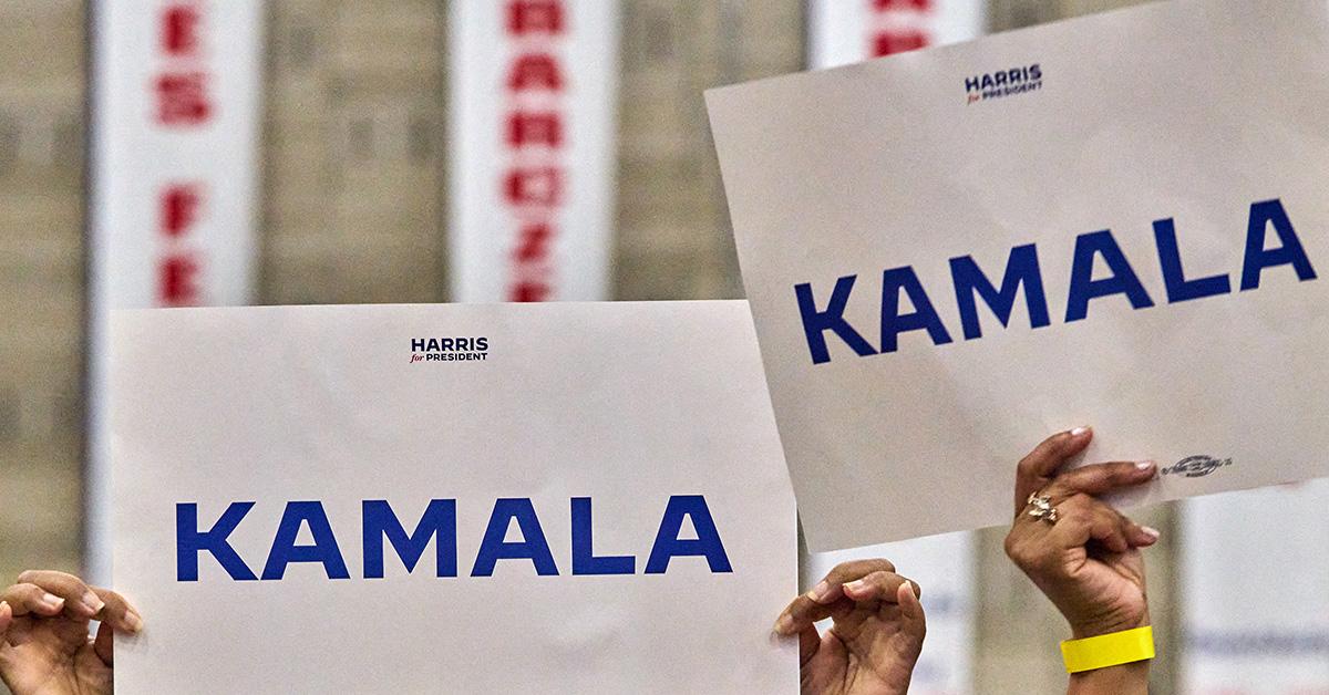 Kamala signs at a Wisconsin event. 