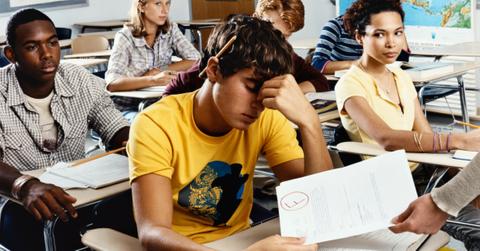 A student is unhappy with his failed exam paper.