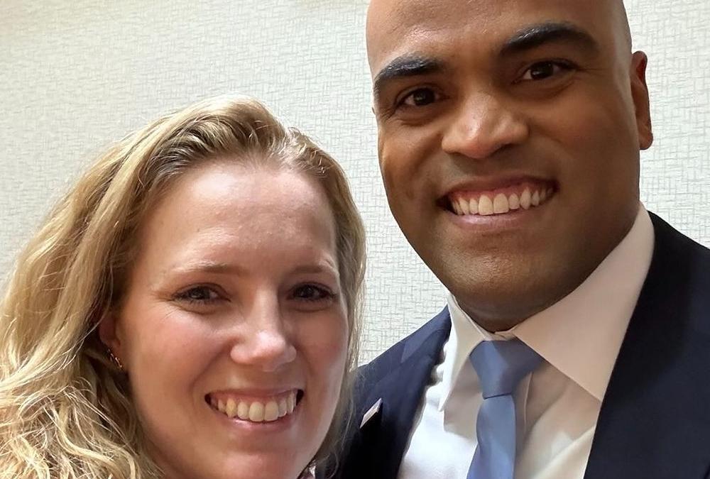 Colin Allred and his wife Alexandra Eber smiling