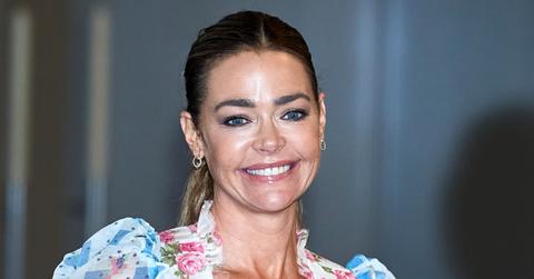 Actress Denise Richards attends "Glow & Darkness" photocall at the Palace Hotel in Madrid, Spain.