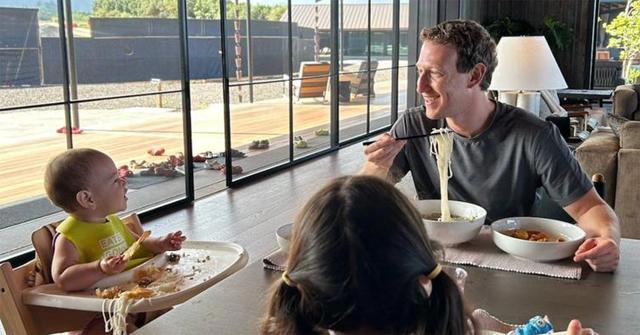 Mark Zuckerberg eating Chinese food with his kids.
