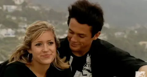 Kristin Cavallari and Stephen Colletti sit close together on 'Laguna Beach'