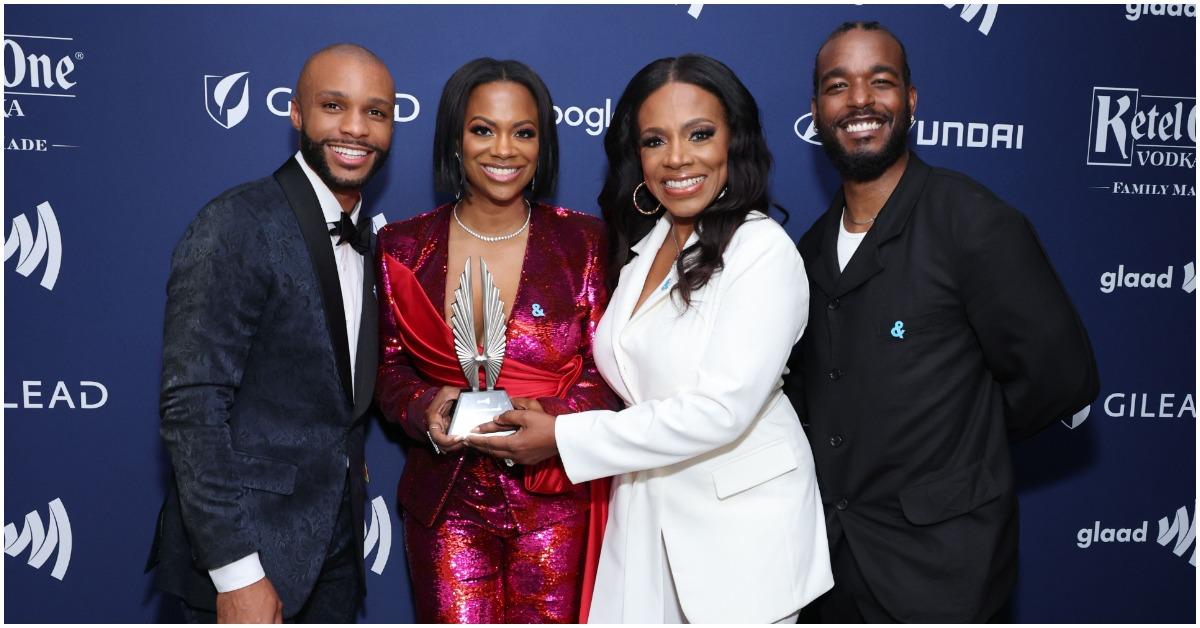 (l-r): Dyllon Burnside, Kandi Burruss, Sheryl Lee Ralph, and Luke James holding an award for 'Thoughts of a Colored Man'