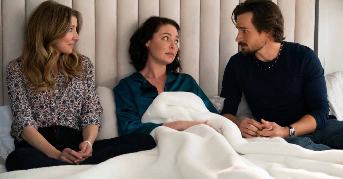 Kate, Tully, and Johnny from Netflix's 'Firefly Lane' sitting in bed together