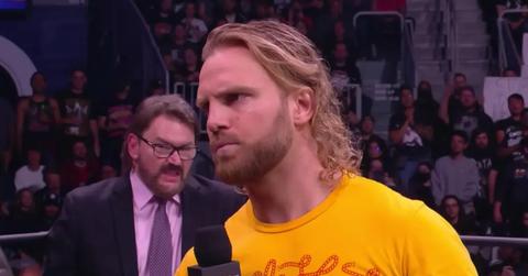 "Hangman" Adam Page speaking into a microphone