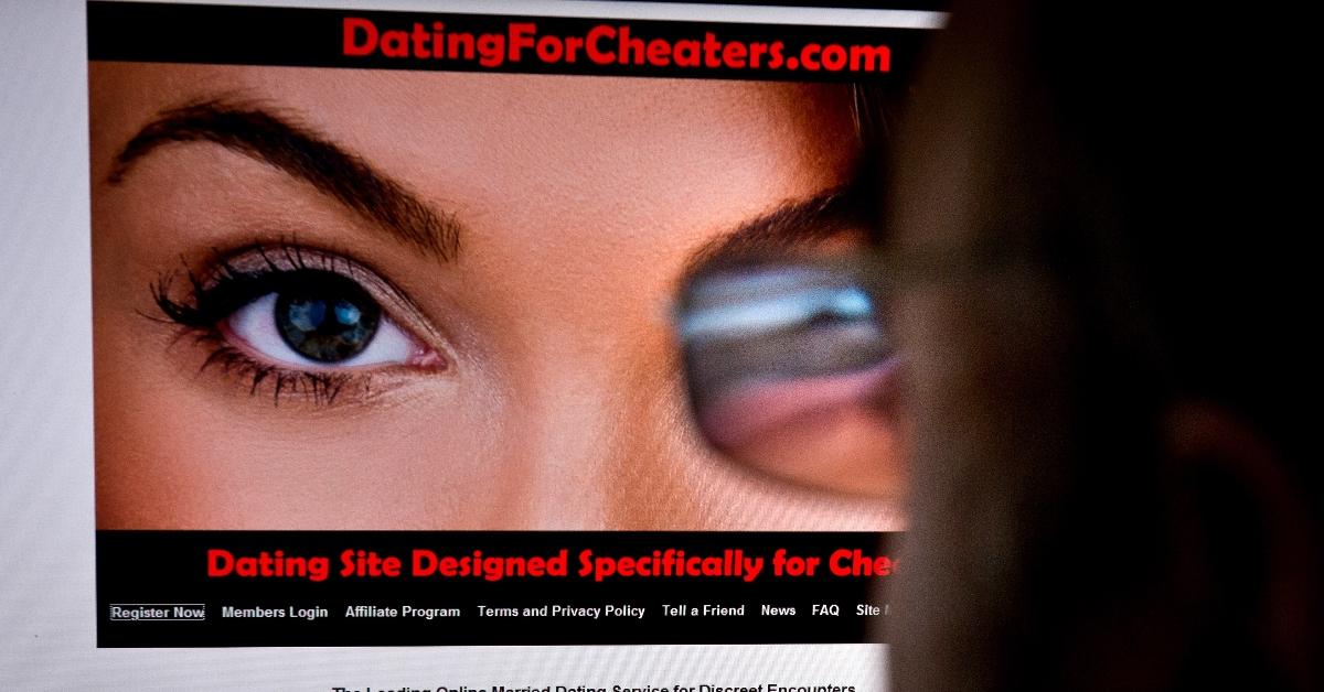 A man looks at the Ashley Madison website