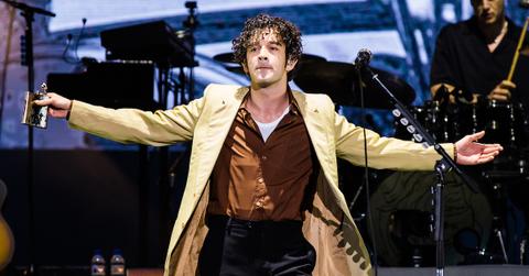 Matty Healy performing on stage