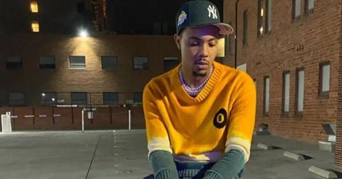 G Herbo sitting in a parking lot